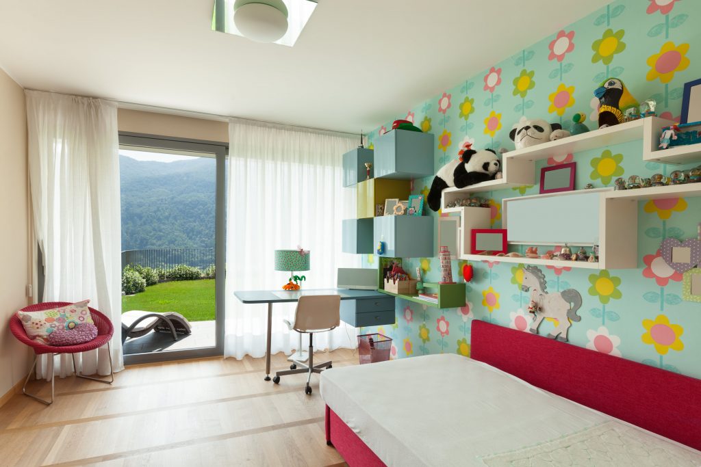 Whimsical kids bedroom with flowers and bold colors