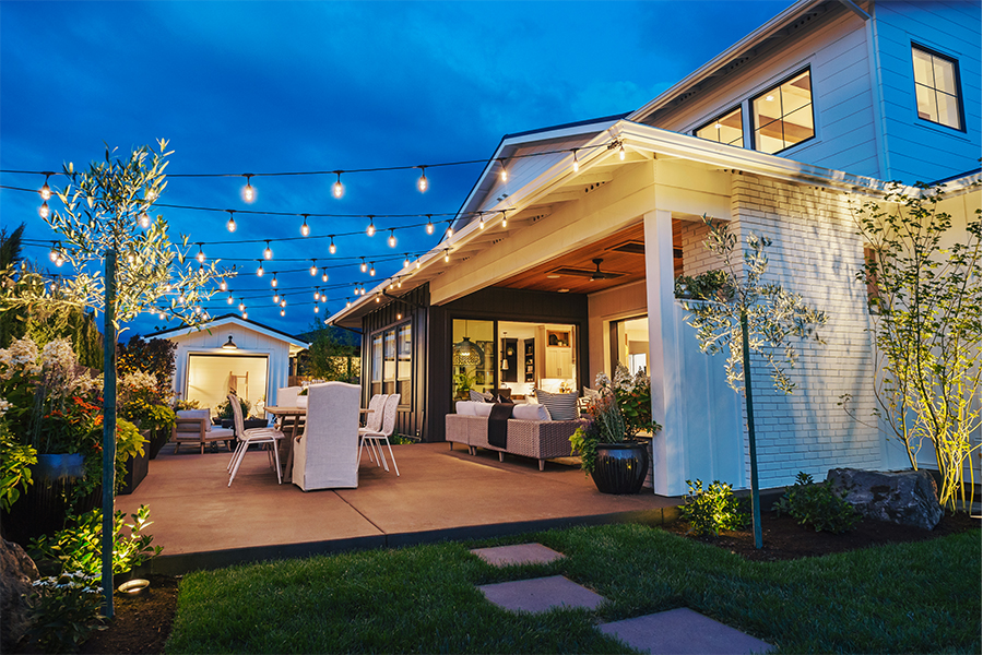 String lights over patio at night