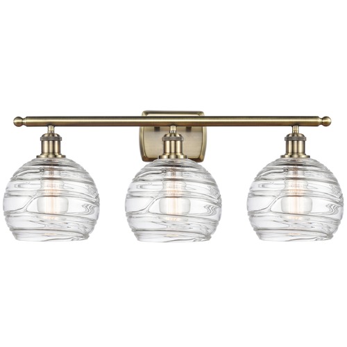 Innovations Lighting Deco Swirl Antique Brass Bathroom Light by Innovations Lighting 516-3W-AB-G1213-8