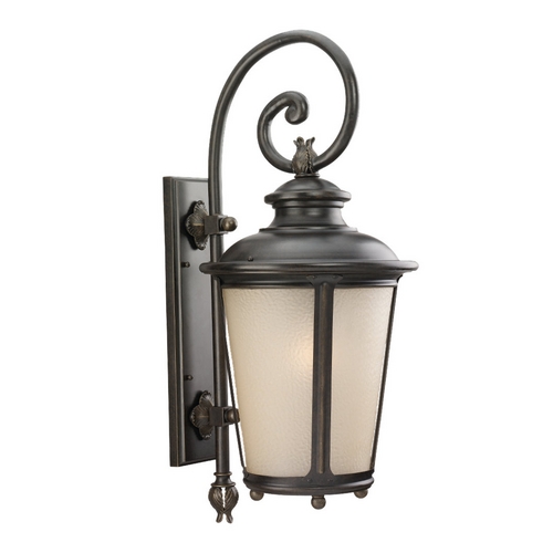 Generation Lighting Outdoor Wall Light with Amber Glass in Burled Iron Finish 88243-780