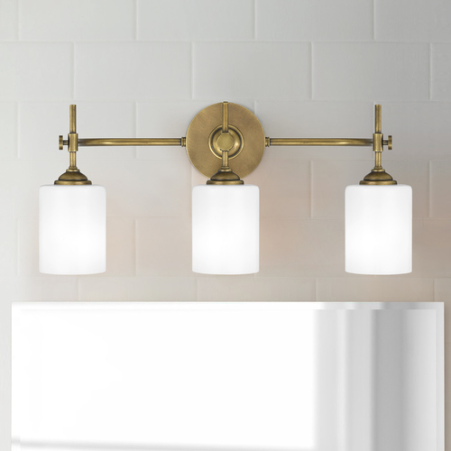 Aria Weathered Brass Bathroom Light by Quoizel Lighting
