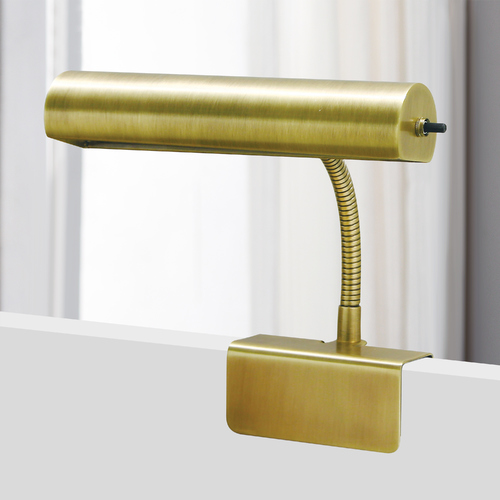 Advent Bed Clamp Lamp in Antique Brass by House of Troy Lighting
